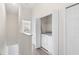 Bright hallway with a washer and dryer at 11622 Colony Lake Dr, Tampa, FL 33635