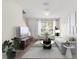 Bright living room with modern decor and large window at 11622 Colony Lake Dr, Tampa, FL 33635