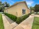 Charming home featuring an attached garage and well-maintained landscaping at 37601 Georgina Ter, Zephyrhills, FL 33542