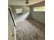 A compact bedroom with a window, offering potential for a cozy retreat with some modernization and design touches at 5026 Osprey Ln, New Port Richey, FL 34652