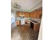 View of the kitchen showcasing a sink and dark appliances, providing a glimpse of the room's layout and potential at 5026 Osprey Ln, New Port Richey, FL 34652