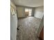 Spacious living room area with natural light, ready for renovation and customization at 5026 Osprey Ln, New Port Richey, FL 34652