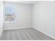 Bright, carpeted bedroom with a window and neutral walls at 7292 Deer Valley Circle, Tampa, FL 33635
