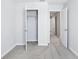 Carpeted bedroom with a walk-in closet at 7292 Deer Valley Circle, Tampa, FL 33635