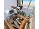 Living room with ocean views, ceiling fan, sliding glass doors to balcony, and modern decor at 19700 Gulf Blvd # 204, Indian Shores, FL 33785