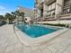 Sparkling pool with poolside seating, perfect for relaxation and enjoying sunny days at 19700 Gulf Blvd # 204, Indian Shores, FL 33785