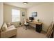 Bright office space with comfortable seating, natural light, modern desk, and a sleek monitor at 2913 Suncoast Plains Dr, Odessa, FL 33556