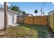 Backyard featuring a new fence and updated landscaping at 1849 New Hampshire Ne Ave, St Petersburg, FL 33703