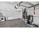 Spacious garage includes laundry hookups, water heater, and storage space at 1849 New Hampshire Ne Ave, St Petersburg, FL 33703