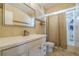 Clean and well-maintained bathroom with a vanity and shower at 2521 Carlisle Pl, Sarasota, FL 34231