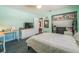 Bright bedroom with desk, dresser and closet at 2521 Carlisle Pl, Sarasota, FL 34231