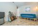 Cozy room with guitars, sofa, and tile floors at 2521 Carlisle Pl, Sarasota, FL 34231