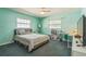 Bedroom with large windows, desk, and ample storage space at 2521 Carlisle Pl, Sarasota, FL 34231