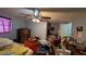Bedroom featuring hardwood floors, a ceiling fan, and some clutter but a great area to decorate at 249 Malvern Dr, Venice, FL 34293