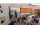Utility room with washer, dryer, and water heater, providing functionality and organization at 249 Malvern Dr, Venice, FL 34293