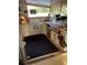 Outdoor kitchen with grill, stove, sink and counter space. Ideal for entertaining at 4713 9Th E St, Ellenton, FL 34222
