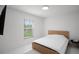 Bedroom with a view of the backyard at 9246 Dayflower Dr, Tampa, FL 33647