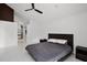 Spacious bedroom with white walls and ensuite bathroom at 9246 Dayflower Dr, Tampa, FL 33647