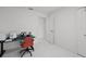 Home office with modern desk, offering a functional and bright workspace for productivity at 9246 Dayflower Dr, Tampa, FL 33647