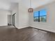 Dining area with a window, pendant lighting and dark wood flooring at 9573 Migue Cir, Port Charlotte, FL 33981