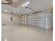 This garage features two bays and clean epoxy floors at 9573 Migue Cir, Port Charlotte, FL 33981