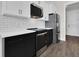 Modern kitchen featuring stainless steel appliances and white subway tile backsplash at 9573 Migue Cir, Port Charlotte, FL 33981