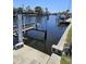 A boat lift on the dock offers convenience for boaters with easy access to the water and nearby marine facilities at 134 Gulfview Rd, Punta Gorda, FL 33950