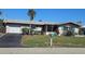 Well-maintained home with a neat front yard, driveway, and mailbox, creating a welcoming curb appeal at 134 Gulfview Rd, Punta Gorda, FL 33950