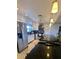 Modern kitchen with stainless steel appliances, granite counters, and bright lighting at 134 Gulfview Rd, Punta Gorda, FL 33950