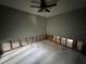 Unfinished bedroom features natural lighting and a ceiling fan at 1801 Hibiscus S Ct, Oldsmar, FL 34677