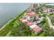 Aerial view of waterfront property and community featuring lush green shoreline at 6218 Palma Del Mar S Blvd # 103, St Petersburg, FL 33715