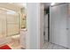 Bathroom featuring a shower-tub, a vanity, and a closet with a washer and dryer at 6218 Palma Del Mar S Blvd # 103, St Petersburg, FL 33715