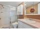 Bathroom with a shower, vanity, and mirrored cabinet providing ample space at 6218 Palma Del Mar S Blvd # 103, St Petersburg, FL 33715
