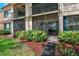 Exterior view of property features lush landscaping and convenient access to amenities at 6218 Palma Del Mar S Blvd # 103, St Petersburg, FL 33715