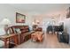 Bright living room with comfortable seating, a dining area, and decor that evokes a coastal atmosphere at 6218 Palma Del Mar S Blvd # 103, St Petersburg, FL 33715