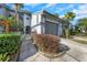 Well-maintained townhome featuring an attached one-car garage and a private gated entrance at 4239 Brentwood Park Cir, Tampa, FL 33624