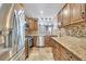 Kitchen with granite countertops, stainless steel appliances, and mosaic tile backsplash at 4239 Brentwood Park Cir, Tampa, FL 33624