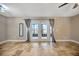 Living room with tile floor, and French doors at 4239 Brentwood Park Cir, Tampa, FL 33624
