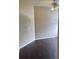Bedroom featuring hardwood floors, base molding and light colored walls at 4706 Dragon Tail Ct, Valrico, FL 33594