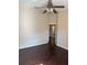 Bedroom with laminate flooring, a ceiling fan, and a neutral color scheme at 4706 Dragon Tail Ct, Valrico, FL 33594