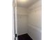 Walk-in closet offering ample storage with wire shelving and wood-look flooring at 4706 Dragon Tail Ct, Valrico, FL 33594