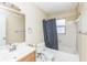 Bathroom with tub and sink at 6310 Cecelia Dr, New Port Richey, FL 34653