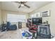 Comfortable room with a ceiling fan, two windows, and ample space for a cozy retreat at 6310 Cecelia Dr, New Port Richey, FL 34653