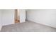Neutral bedroom with carpeted flooring and natural light from a window at 1732 Brekey Way, Zephyrhills, FL 33541