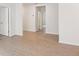 A light-filled room with tile floors and neutral walls, awaiting your personal touch at 1732 Brekey Way, Zephyrhills, FL 33541
