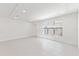Bright, spacious bedroom with large windows, neutral walls, and recessed lighting at 17330 Alderwood Ln, Punta Gorda, FL 33982