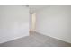 Bedroom with neutral carpet at 1806 Draughton Dr, Zephyrhills, FL 33541