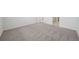 Expansive bedroom featuring neutral carpet and trim at 1817 Draughton Dr, Zephyrhills, FL 33541