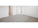 Cozy bedroom featuring neutral carpet and ample natural light at 3539 Moscato Dr, Brooksville, FL 34602