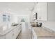 Beautiful kitchen with granite countertops, stainless steel appliances, and backyard view at 3539 Moscato Dr, Brooksville, FL 34602